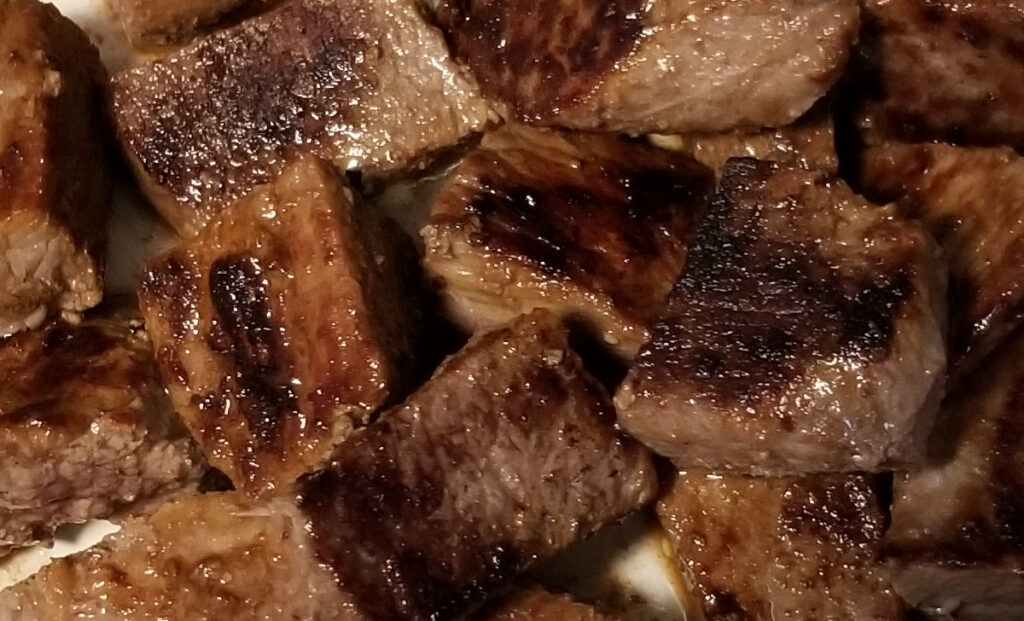 A close up of browned stew meat. 
