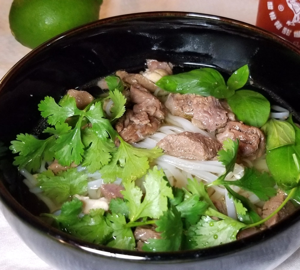 Meat scrap pho with thai basil and cilantro