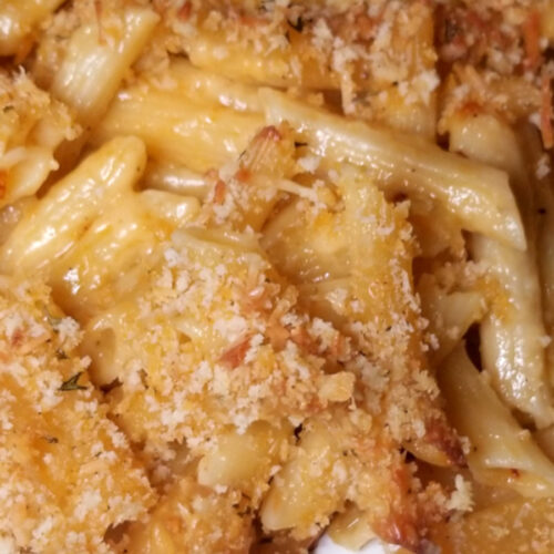 A close up of buffalo mac and cheese on a plate.