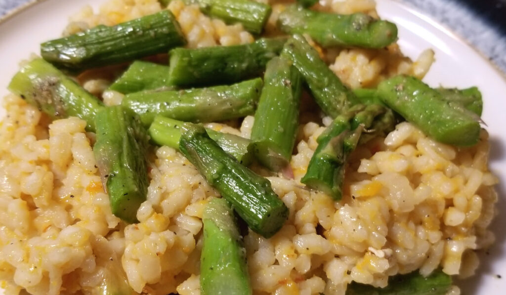 Butternut squash risotto served with roasted asparagus. 