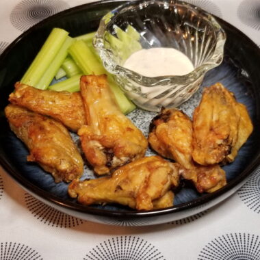 Air fried chicken wings with celery and ranch