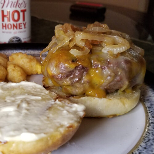 Homemade burger with caramelized onions and aioli.