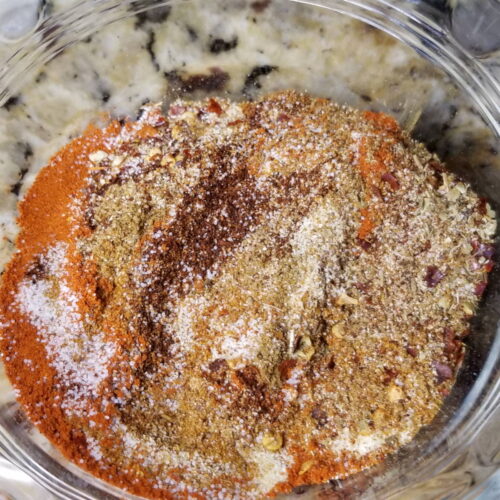 A close up of southwest seasoning not yet fully mixed in a bowl.